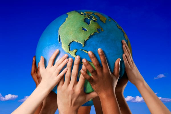 image of hands holding the Earth